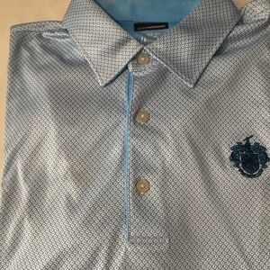 Men’s golf shirt by Greg Norman XL.